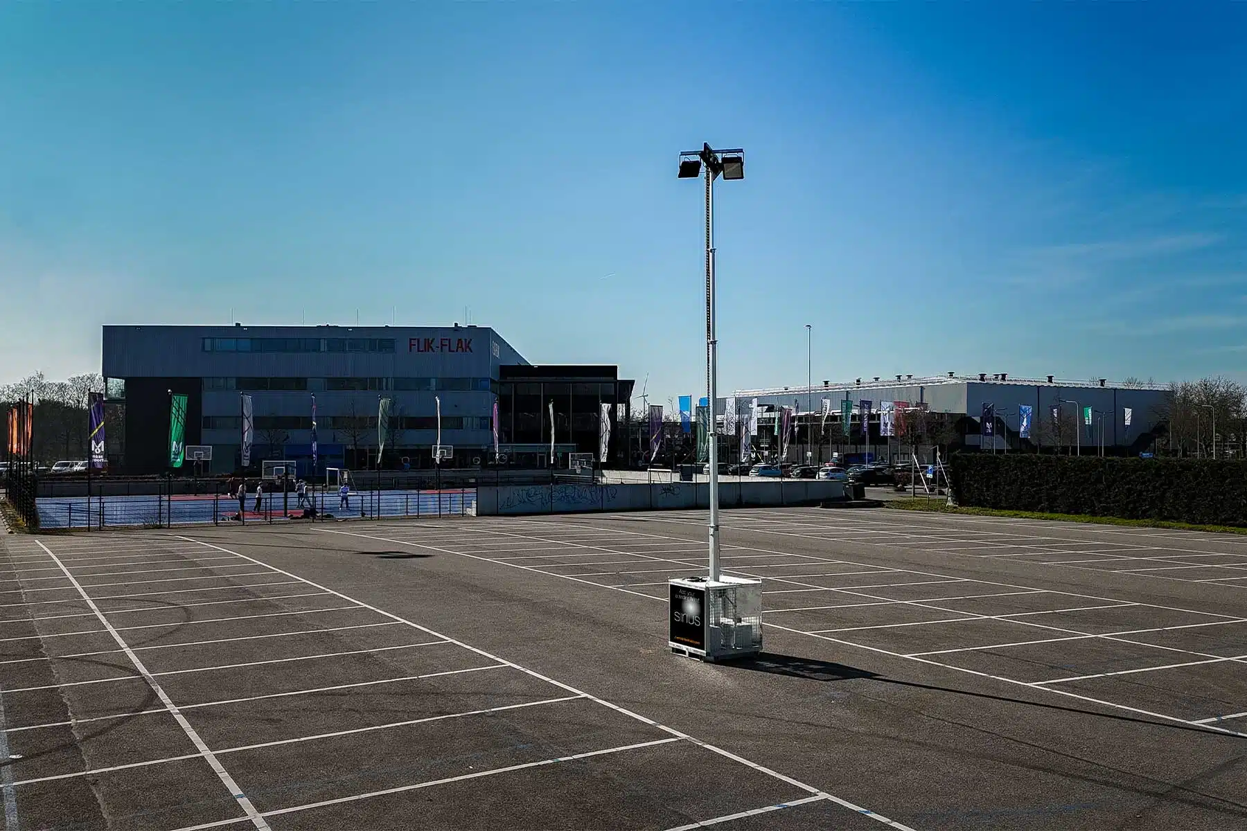 Mobile light tower in parking lot